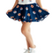 A child wearing a navy blue ruffled skirt with an orange and white tiger face pattern, paired with a white sleeveless top and white sneakers, shown from the chest down on a white background.