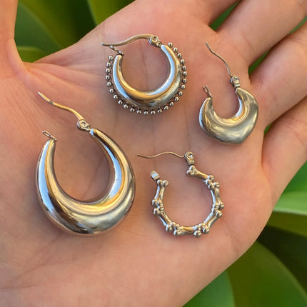 RIVETED MOON HOOPS
