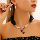 Earrings + necklace (2 pieces)