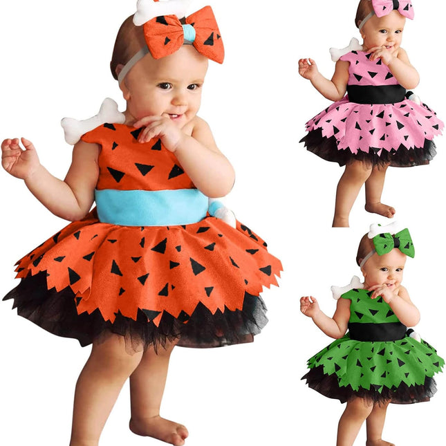 Three children in colorful tutu dresses with headbands on a white background