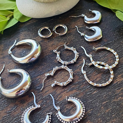 RIVETED MOON HOOPS