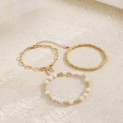 Minimalist Bow Pendant Bracelet with Pearl Accents