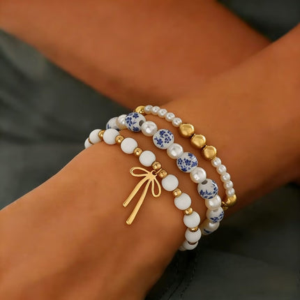 Minimalist Bow Pendant Bracelet with Pearl Accents