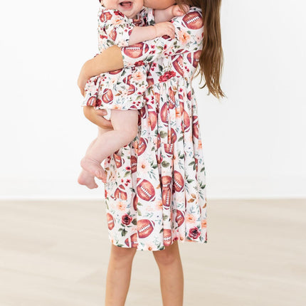 Footballs & Flowers 3/4 Sleeve Twirl Bodysuit