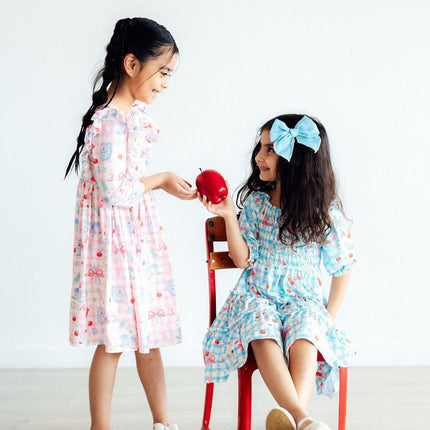 Honor Roll Smocked Ruffle Dress