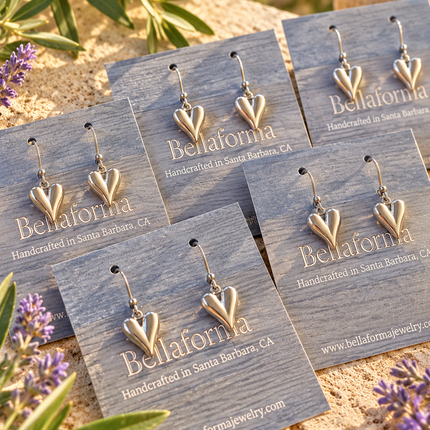 SILVER SCULPTED HEART EARRINGS