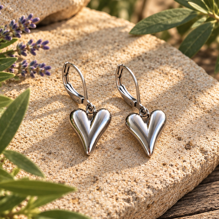 SILVER SCULPTED HEART EARRINGS