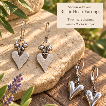 SILVER SCULPTED HEART EARRINGS