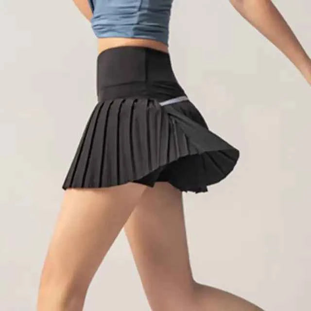 Onyx Flow Pleated Athletic Skirt – Built-In Shorts & Pockets